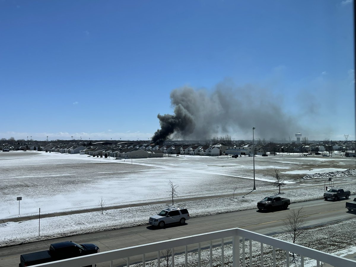 Fargo fire crews are responding to a massive fire on 57th Avenue South. The roof of a town home is torn through.