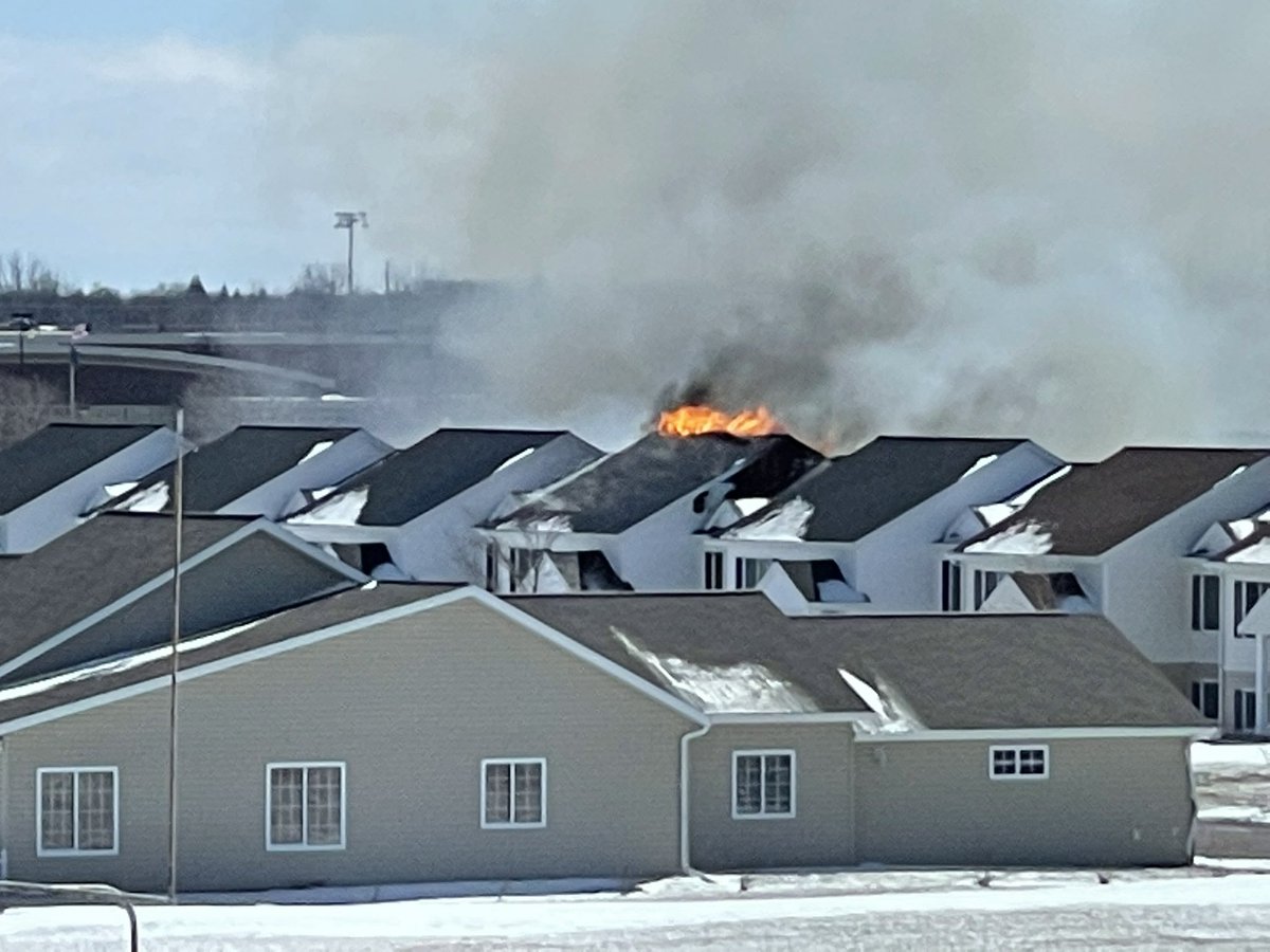 Fargo fire crews are responding to a massive fire on 57th Avenue South. The roof of a town home is torn through. 